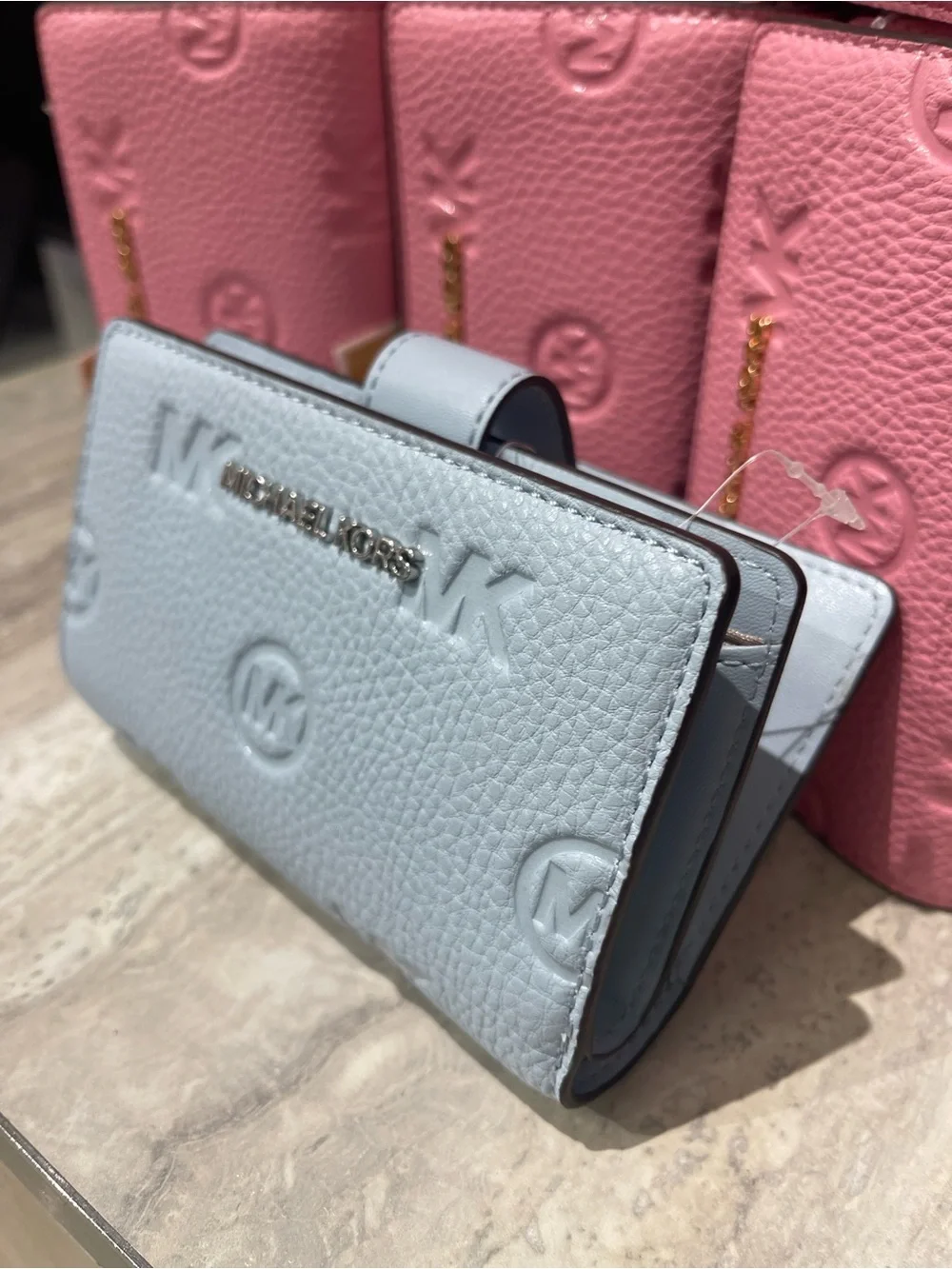 Michael Kors Embossed Logo Trifold Wallet - Light Blue